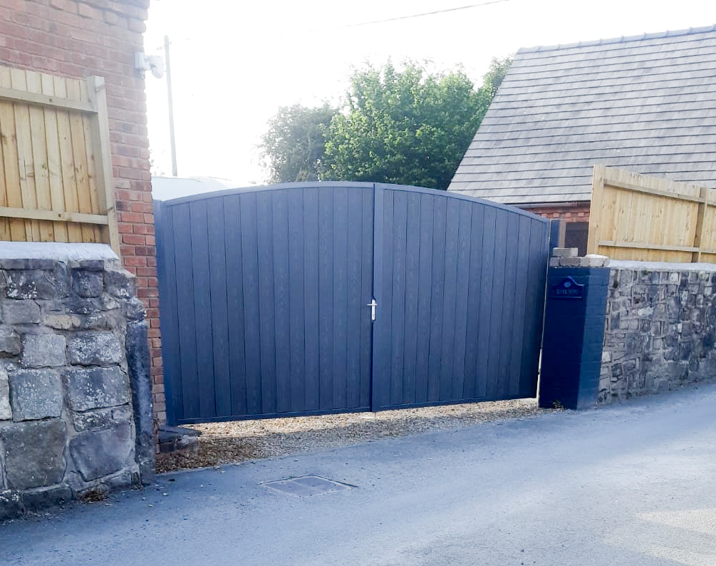 Side and pedestrian access gate designed to match the main entrance
